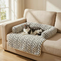 Cat lying on the white herringbone Cozy Sofa Mat on a beige sofa