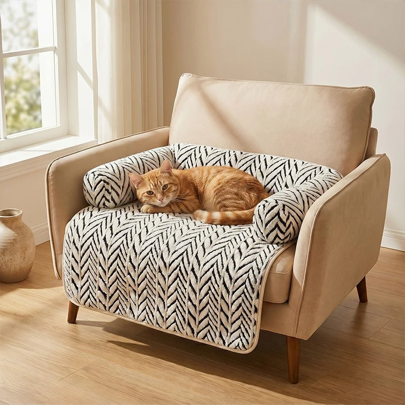 Orange cat curled up on the Cozy Sofa Mat in an armchair