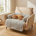 Orange cat curled up on the Cozy Sofa Mat in an armchair